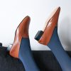 Ops&Ops No11 Cinnamon block heels with blue tights on sofa