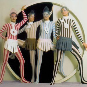 Action! Pierre Cardin striped bodysuits and geo skirts
