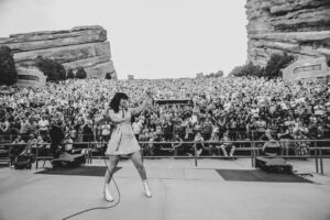 Nicole Atkins in Silver Duo on stage at Red Rocks