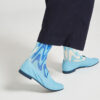 Ops&Ops No10 Action Light Blue leather flats back close-up worn here with blue paisley socks and navy cropped trousers