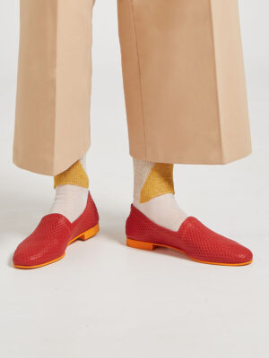 Ops&Ops No10 Action Red leather flats close-up worn with gold socks, and cropped tan trousers