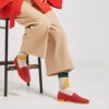 Ops&Ops No10 Action Red leather flats worn with colour-block socks, tan cropped trousers and tie-belt vibrant jacket
