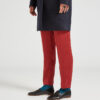 Ops&Ops No10 Classic Black leather flats worn with navy wool coat, rust-coloured slim-leg trousers and teal socks
