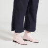 Ops&Ops No12 Pink Frost leather go-go boots, worn with cropped navy blue trousers