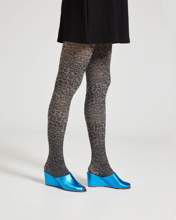 Ops&Ops No15 Turquoise leather wedge mules worn with grey animal print tights and short black dress