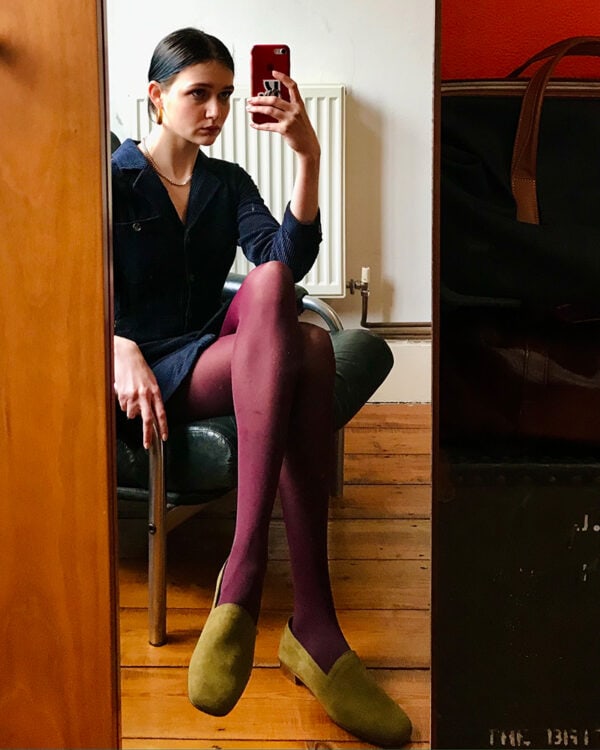 Reflection: No17 Olive nubuck loafers worn with purple tights and dark dress