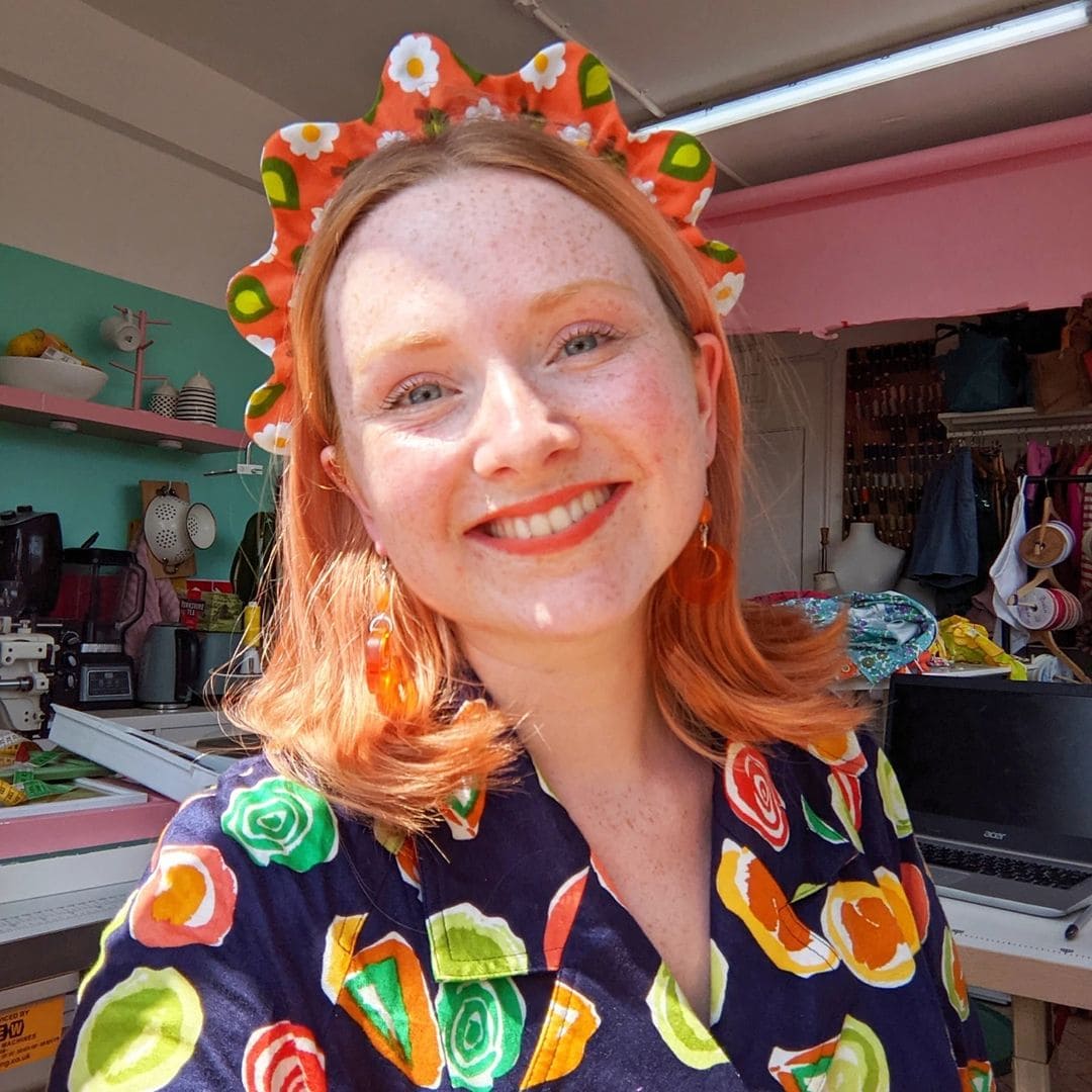 Designer Carmen Christine models one of her headbands