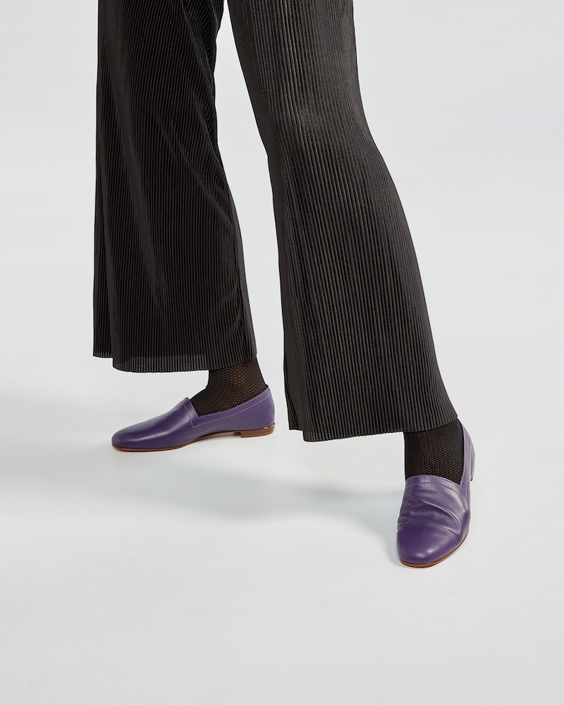Ops&Ops No10 Royal Purple flats styled with black sun-ray pleated flared trousers