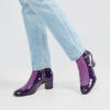 Marla in Ops&Ops No16 Purple Duo boots and faded jeans from the side