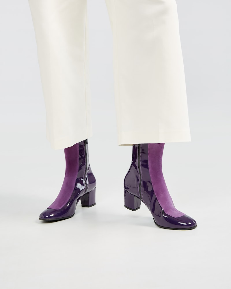 Marla in Ops&Ops No16 Purple Duo boots and wide, cropped off-white trousers