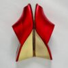Ops&Ops No15 pair of red and gold metallic leather wedge mules with heels together