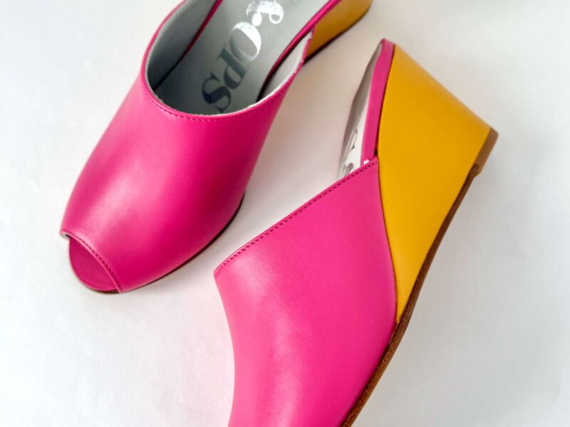 Ops&Ops No15 pair of pink and mustard leather wedge mules one on side one from above in sample sale
