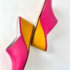 Ops&Ops No15 pair of pink and mustard leather wedge mules side view in sample sale