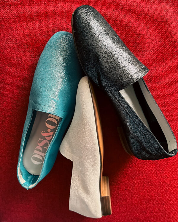 Ops&Ops No10 flats in Lurex Blue, Lurex White, Lurex Black on a red background