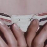 Tonite Let's all Make Love in London main pic – person undoing bra strap